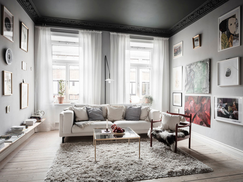 Царство постеров и черный потолок: атмосферная квартира в Швеции (70 кв. м)