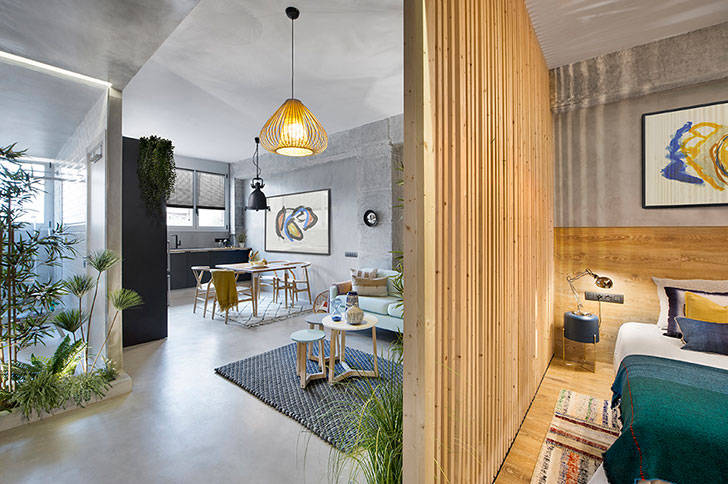 Бетон и дерево: индустриальный дизайн маленькой квартиры в Барселоне (46 кв. м)