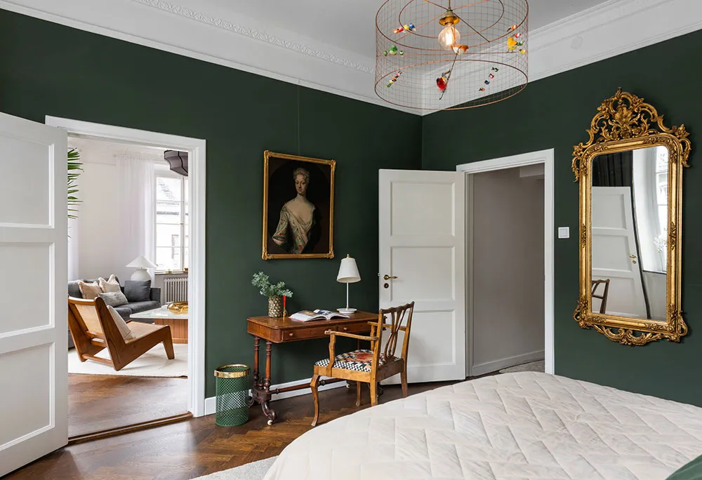 Piękny skandynawski mieszkanie z czarną kuchnią i zieloną sypialnią - Gallery image 13