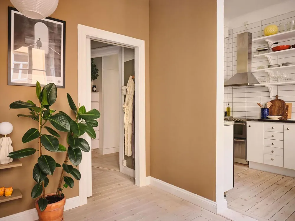 Красивые оттенки коричневого, желтого и зеленого в дизайне шведской квартиры (32 кв. м) - Gallery image 10