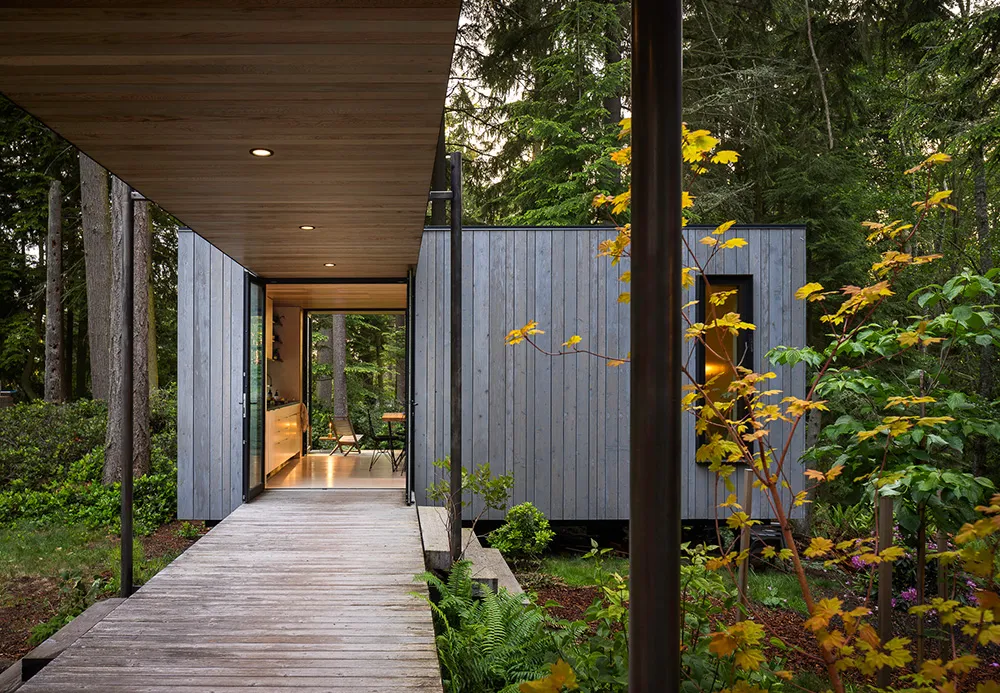 Kleines modulares Haus im Wald mit korridoren ohne wände - Gallery image 11