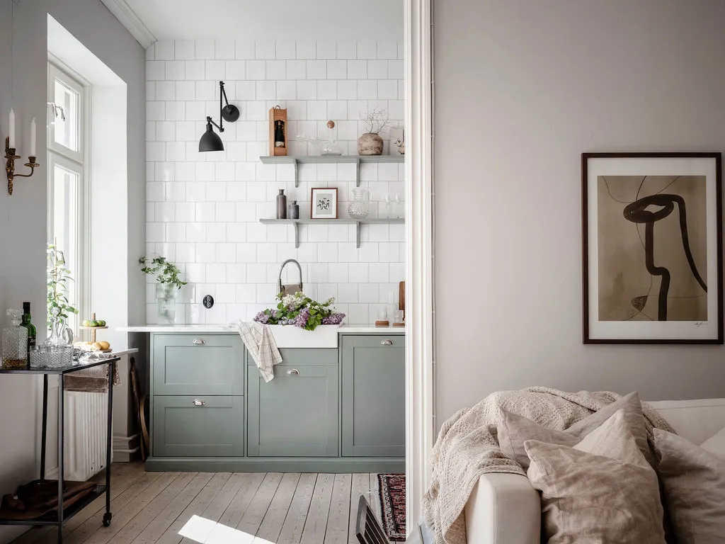Винтажний буфет і пилково-зелена кухня: світла квартира в Швеції (64 кв. м) - Gallery image 13