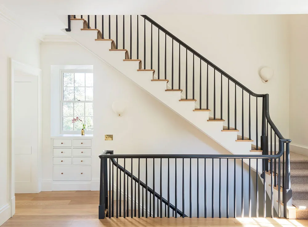 Bright and elegant interiors of a magnificent colonial house in the USA - 19