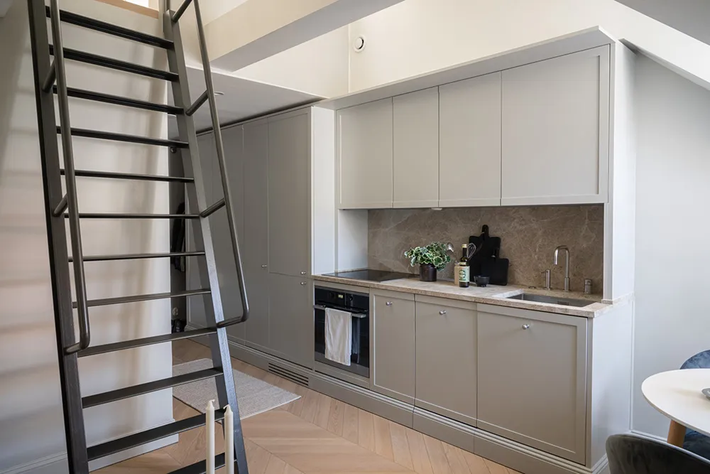 Компактная двухуровневая мансарда в центре Стокгольма (34 кв. м) - Gallery image 4