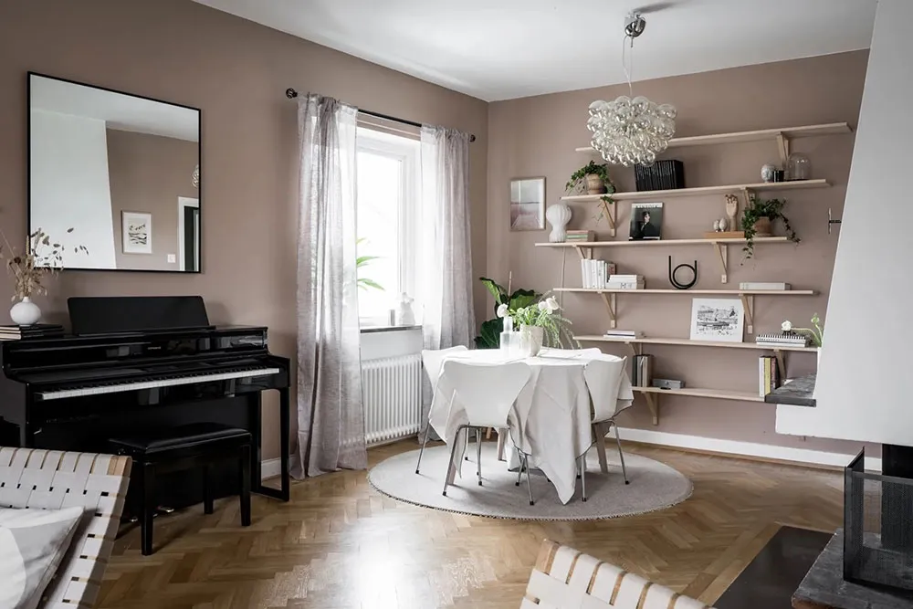Appartement suédois cosy avec murs de café et mobilier vintage - Gallery image 4