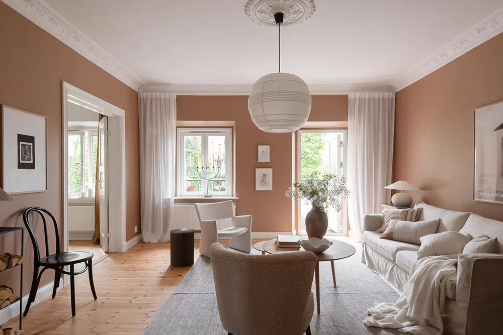 Salle de séjour en terre cuite et cuisine fraîche : appartement à Göteborg - Gallery image 10