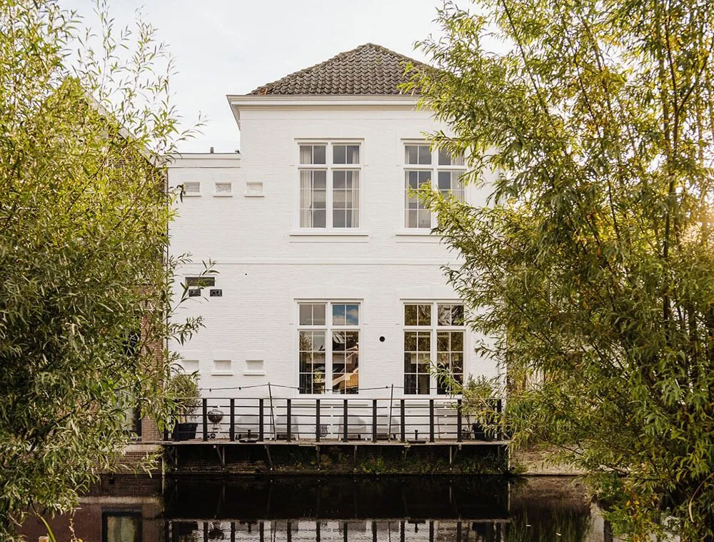 Black floors, white ceilings: amazing house in former school building in Netherlands - Gallery image 28