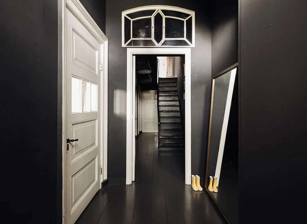 Black floors, white ceilings: amazing house in former school building in Netherlands - Gallery image 27