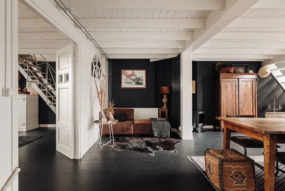 Black floors, white ceilings: amazing house in former school building in Netherlands - Gallery image 7