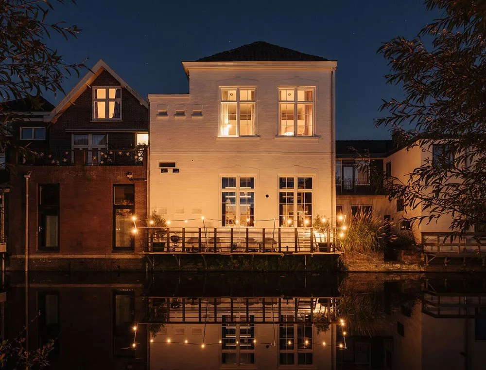 Black floors, white ceilings: amazing house in former school building in Netherlands - Gallery image 31