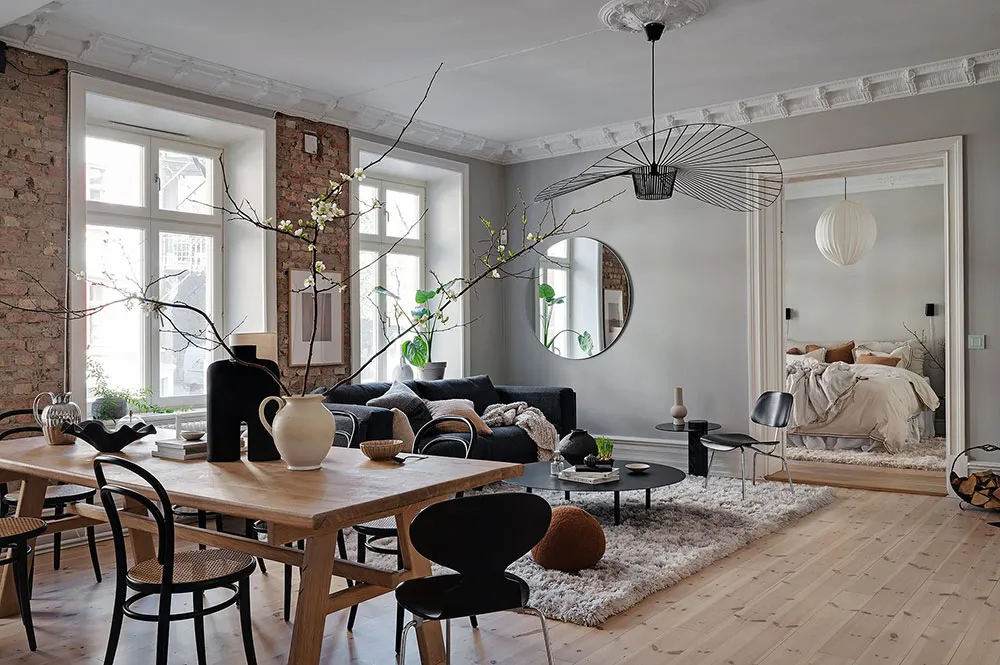 Pared de ladrillo y tonos tierra: apartamento en Gotemburgo (88 m²) - Gallery image 1