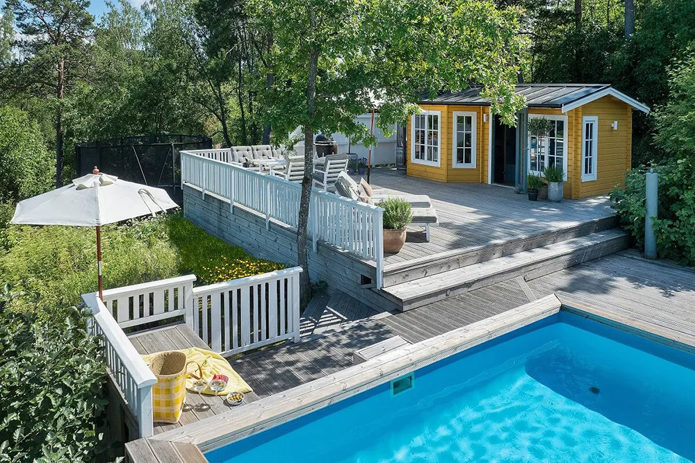 Stylowe odcienie w дизайnie tradycyjnej乡村 wиллы przy jeziorze w Szwecji - Gallery image 25