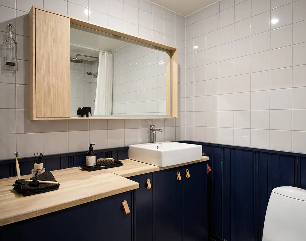 Inteligentna planista i przemysłowe detale: klasyczna studia w Szwecji (56 m²) - Gallery image 12