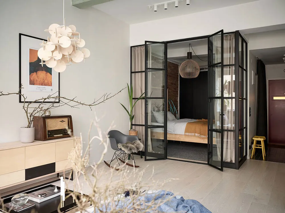 Inteligentna planista i przemysłowe detale: klasyczna studia w Szwecji (56 m²) - Gallery image 3