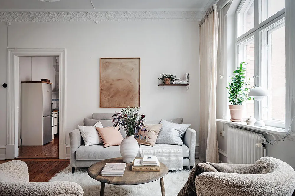 Мягкий декор и фрагменты кирпичной стены на кухне: небольшая квартира в Гетеборге (46 кв. м) - Gallery image 15