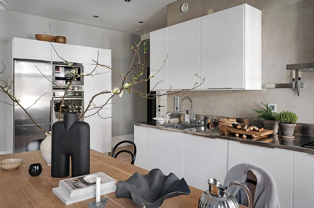 Pared de ladrillo y tonos tierra: apartamento en Gotemburgo (88 m²) - Gallery image 9