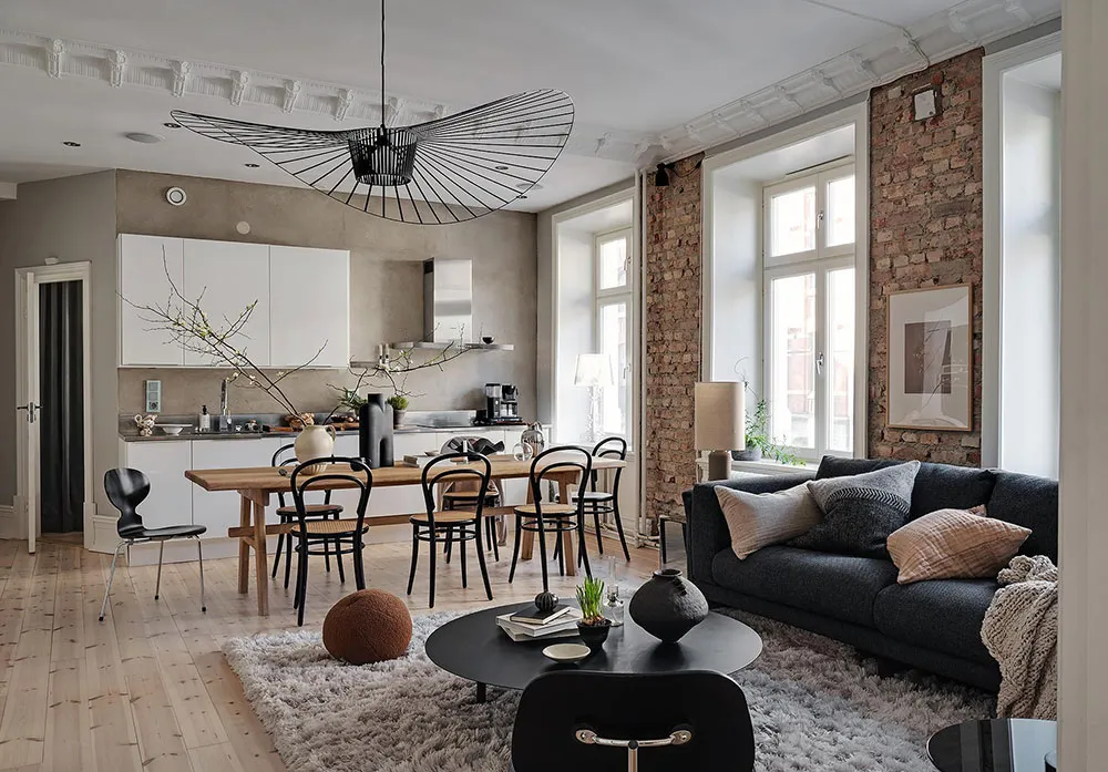 Pared de ladrillo y tonos tierra: apartamento en Gotemburgo (88 m²) - Gallery image 2