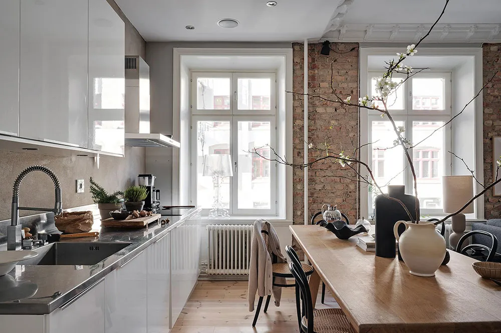 Pared de ladrillo y tonos tierra: apartamento en Gotemburgo (88 m²) - Gallery image 7