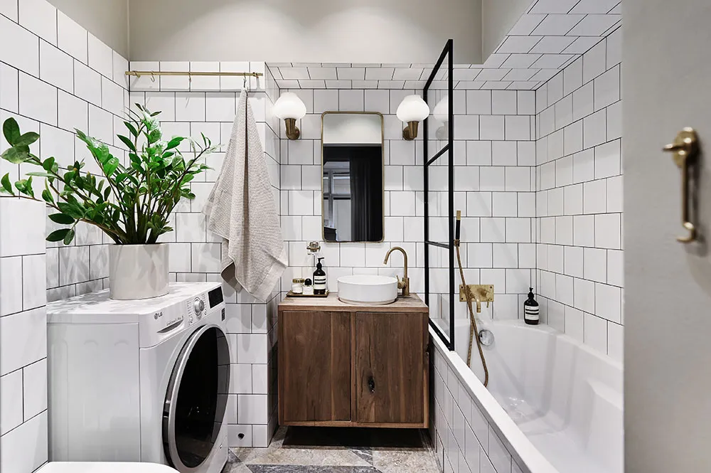 Kitchen without upper cabinets and fireplace: bright first-floor apartment in Stockholm - Gallery image 14