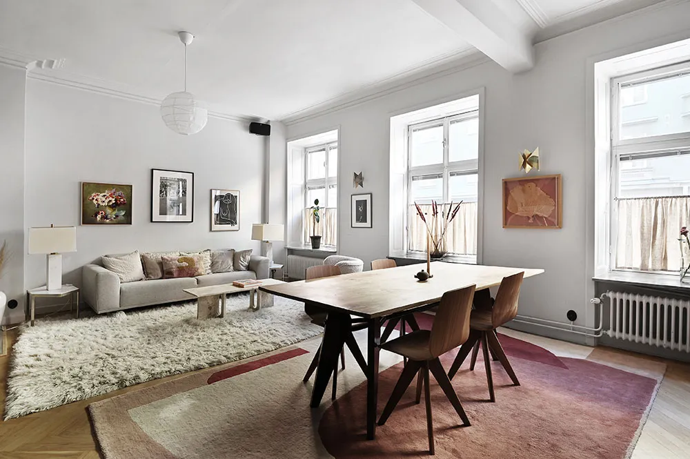 Kitchen without upper cabinets and fireplace: bright first-floor apartment in Stockholm - Gallery image 5