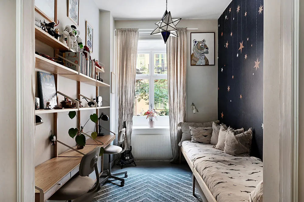 Kitchen without upper cabinets and fireplace: bright first-floor apartment in Stockholm - Gallery image 12