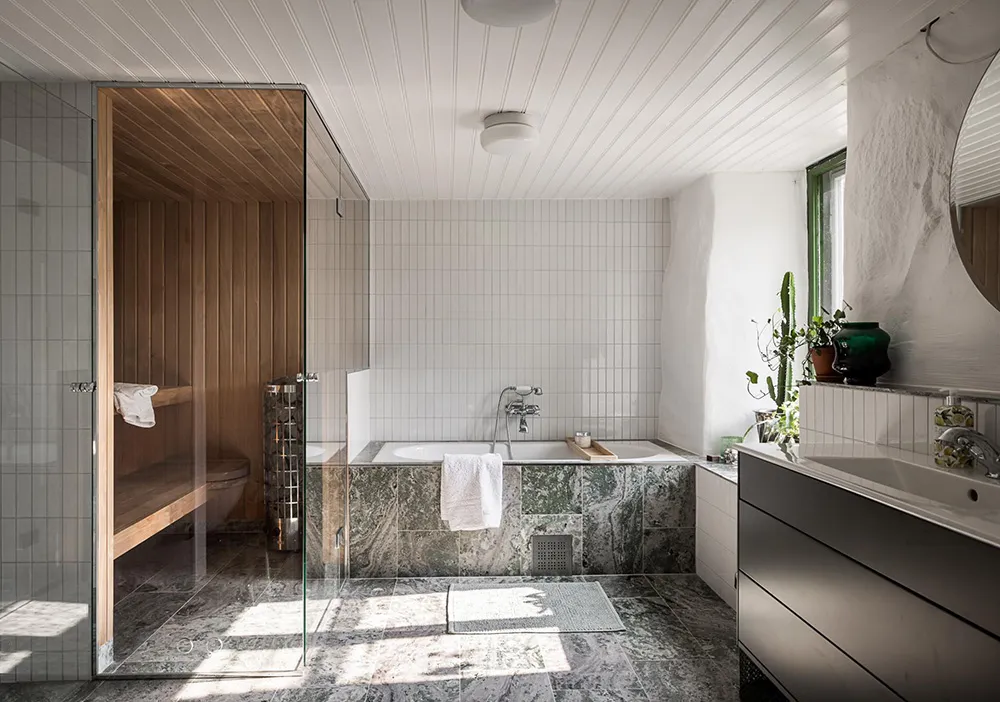 Intérieurs chaleureux d'une belle villa en bois en Suède - Gallery image 31