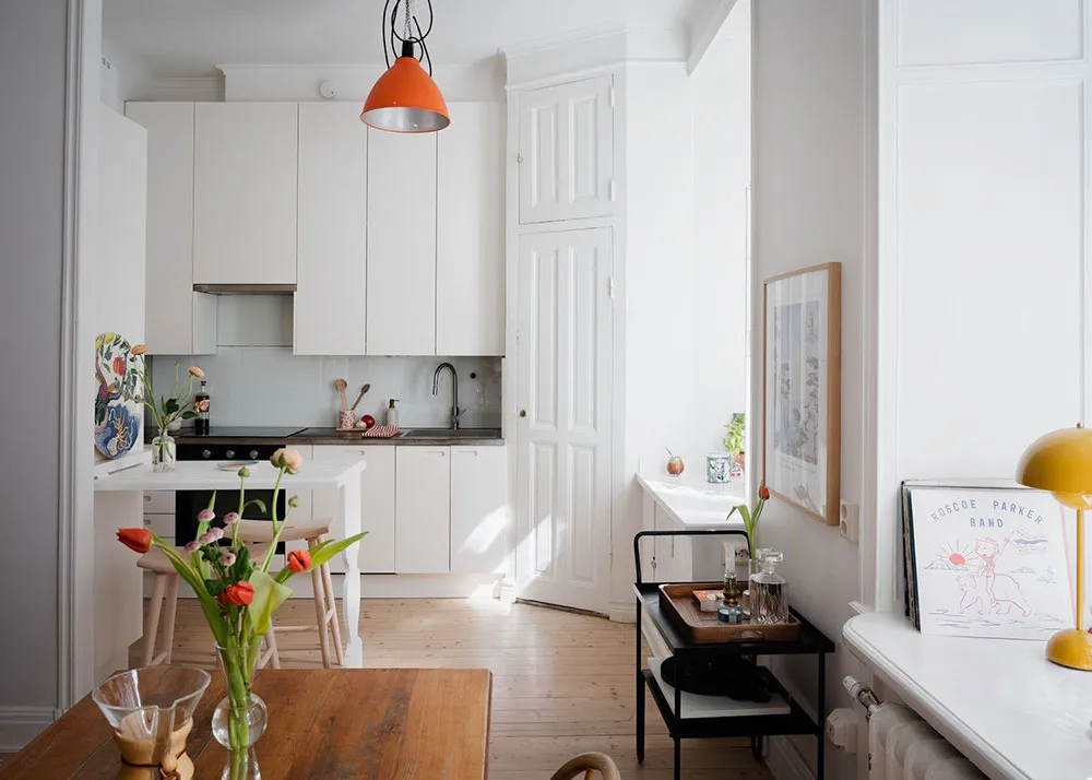 Jolie appartement scandinave avec canapé rose et cuisine blanche (49 m²) - Gallery image 4