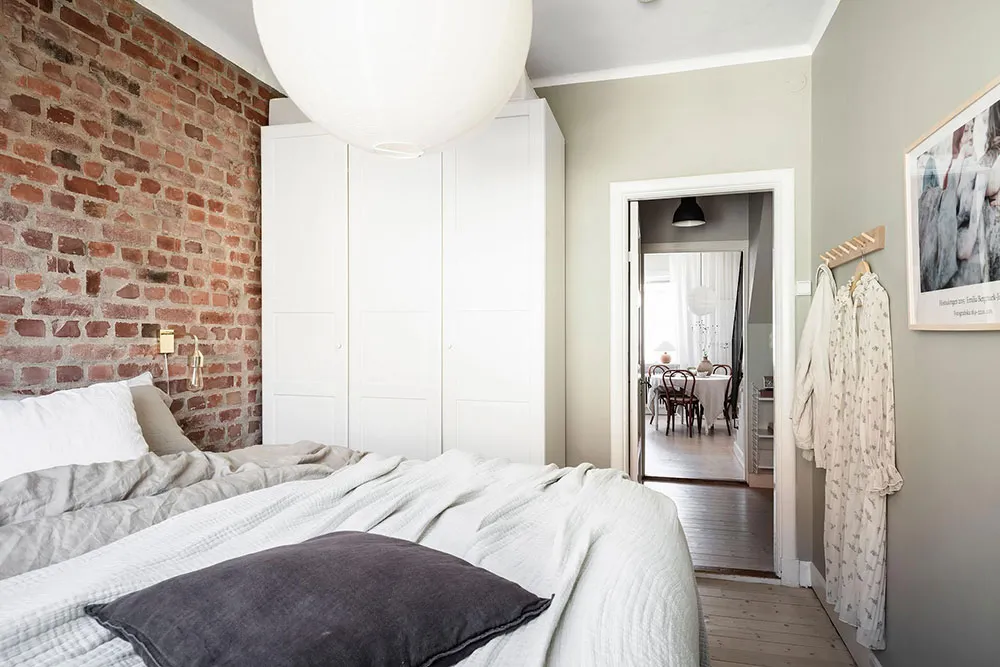 Mała dwupoziomowa kwatera z belkami w Szwecji (55 m²) - Gallery image 29