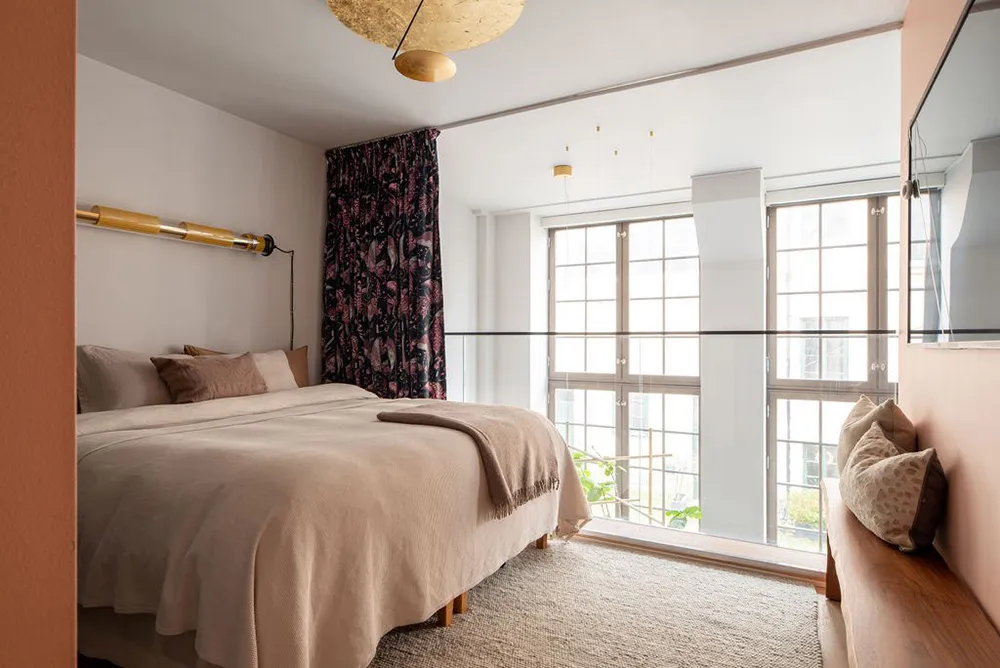 Zweiter Licht und pastellfarbene Töne: Loft in einem historischen Gebäude in Stockholm - Gallery image 11