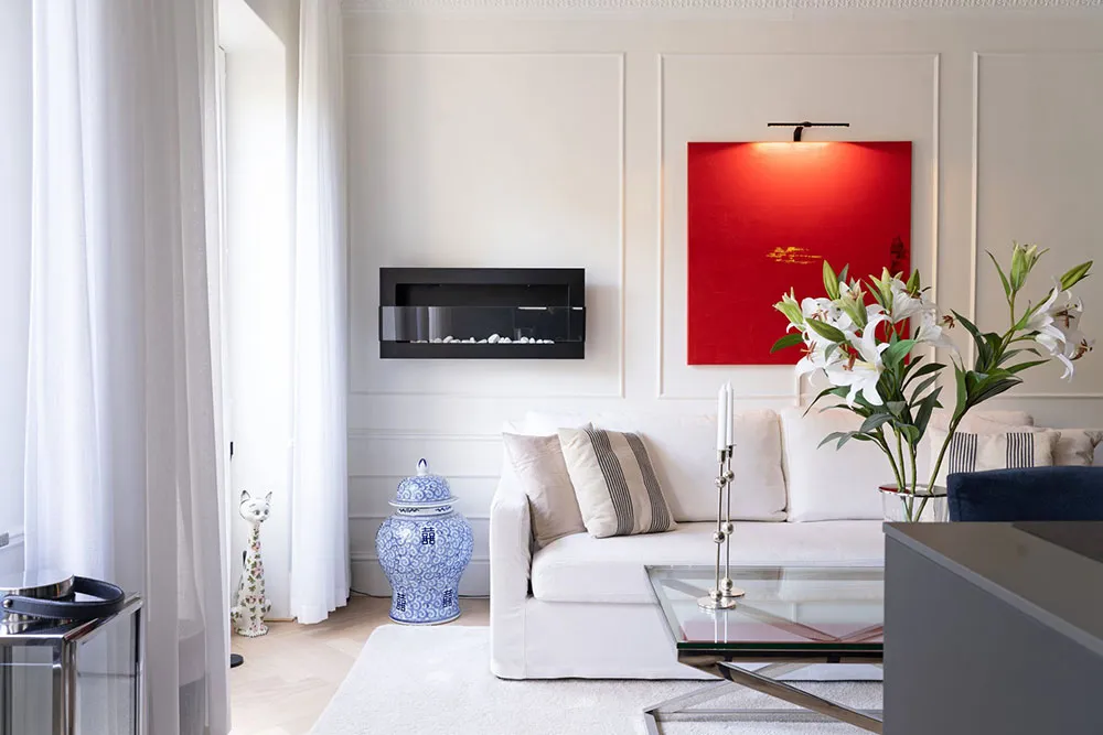 Black Kitchen and Park View: Small Modern Apartment in Stockholm (37 sqm) - Gallery image 1