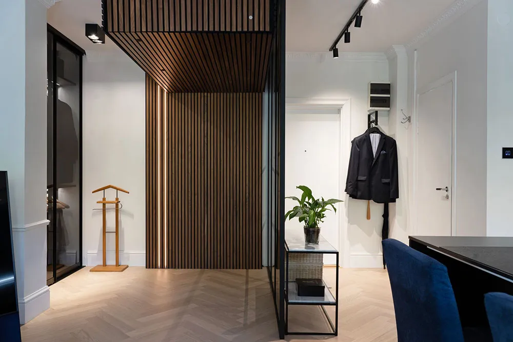 Black Kitchen and Park View: Small Modern Apartment in Stockholm (37 sqm) - Gallery image 12