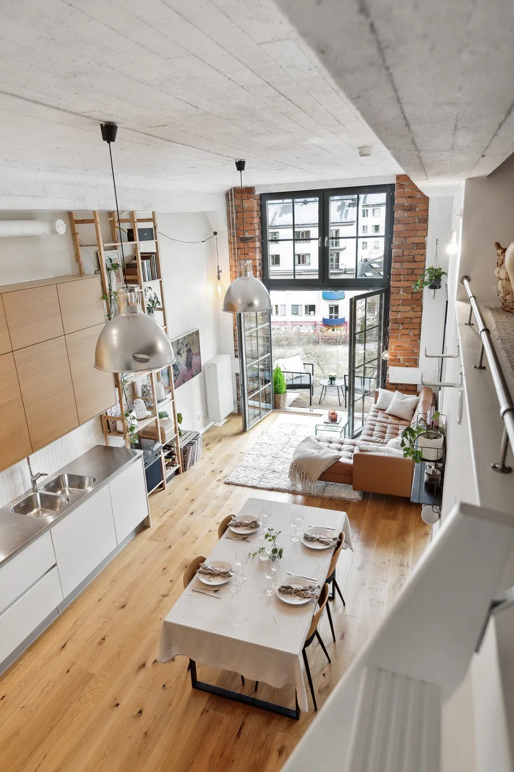 Brique, béton et style scandinave : appartement dans une ancienne usine à Stockholm (54 m²) - Gallery image 1