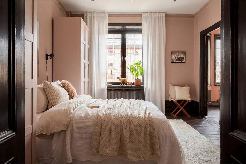 Терракотові стіни та темні акценти: нестандартна квартира в Стокгольмі (60 кв. м) - Gallery image 14