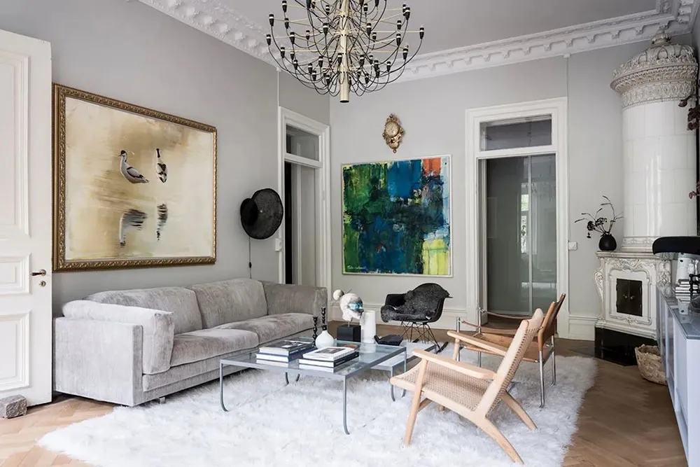 क्लासिक फ्रेमों में लगी पेंटिंगें एवं आधुनिक सजावट: गोथेनबर्ग में एक सुंदर अपार्टमेंट - Gallery image 6