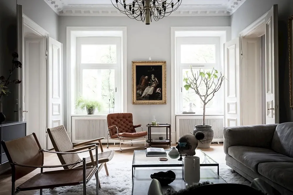 क्लासिक फ्रेमों में लगी पेंटिंगें एवं आधुनिक सजावट: गोथेनबर्ग में एक सुंदर अपार्टमेंट - Gallery image 5