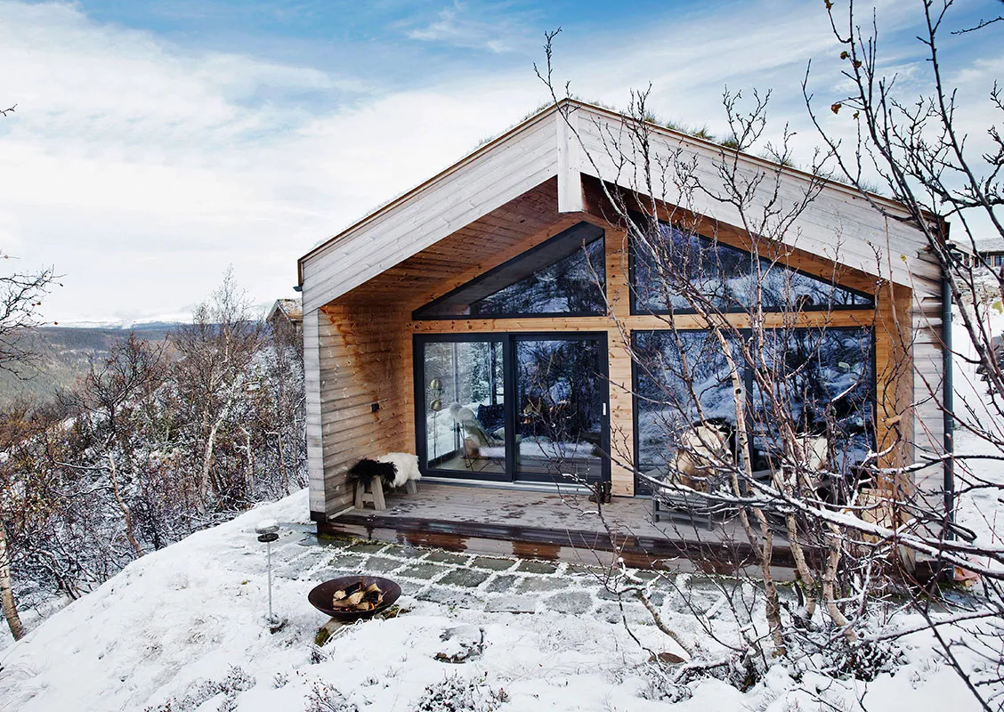 Interior in Blue and Green Tones for a Mountain House in Sweden - Gallery image 2