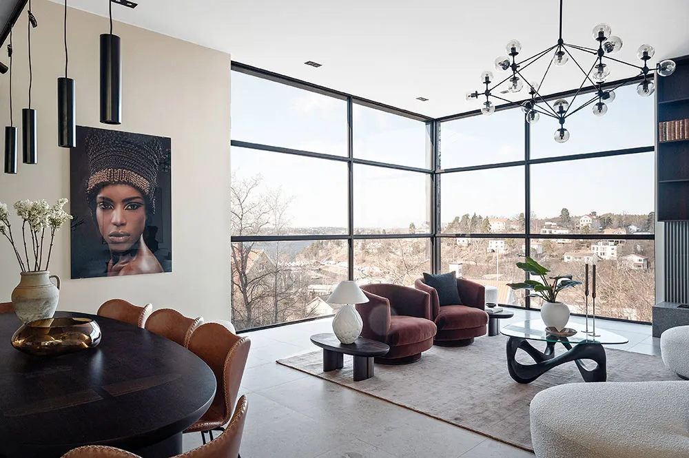 スウェーデンにある、夕日の景色を楽しめるモダンな住宅で、インテリアも上品です。 - Gallery image 4