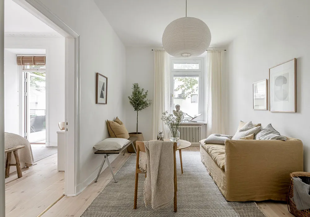 Sand-beige accents in the design of a light Scandinavian apartment (55 sq. m) - Gallery image 1