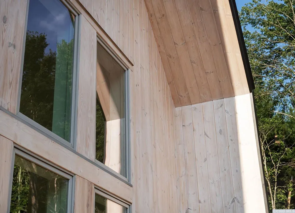 Високі стеля та багато вікон: будинок у амбарному стилі посеред лісу - Gallery image 20