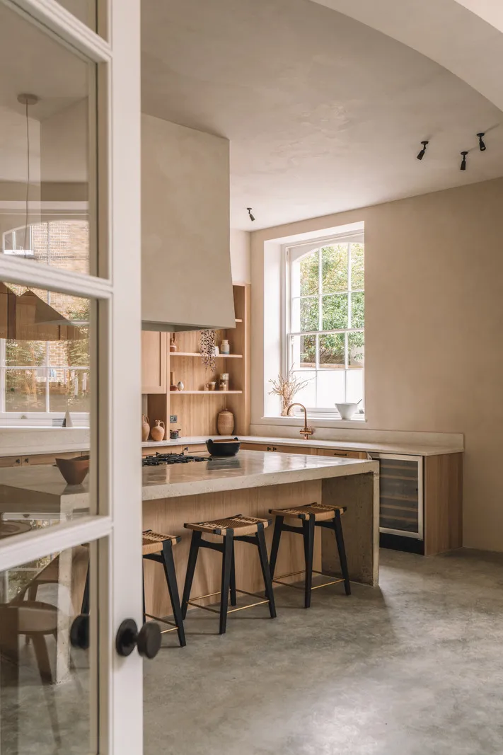 Earthy tones and minimalist design: apartment in a former school in England - Gallery image 1