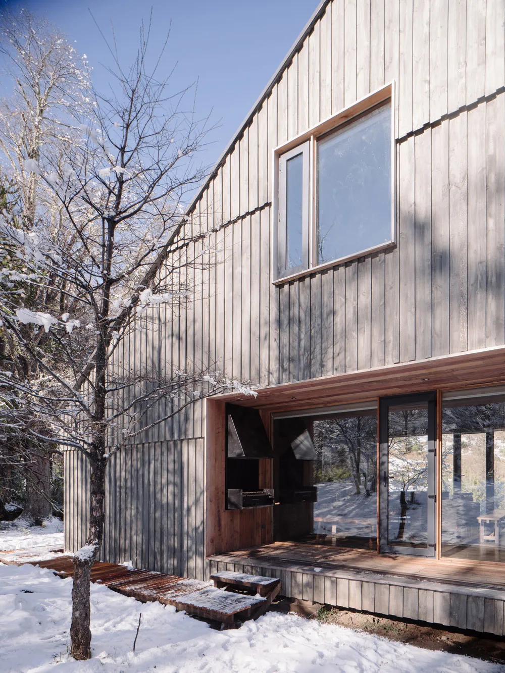 Modernes Shalé mitten im verschneiten Wald in Chile - Gallery image 19