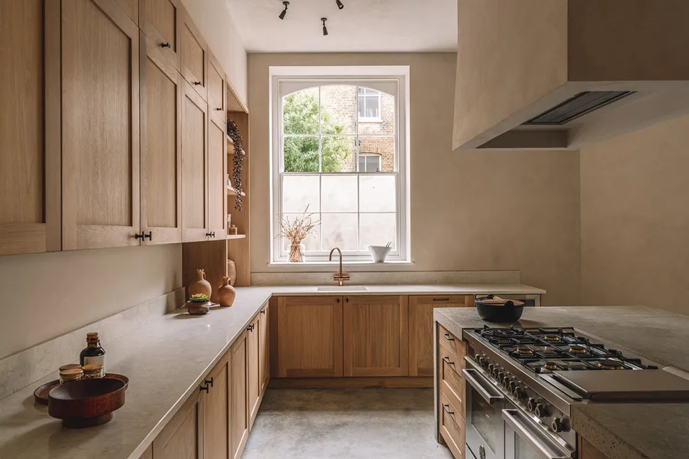 Earthy tones and minimalist design: apartment in a former school in England - Gallery image 9