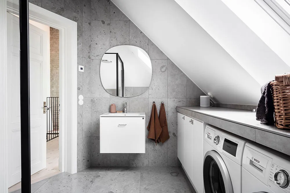 Luminosa y elegante apartamento de mansardas con ventanales de lujo en Suecia - Gallery image 14