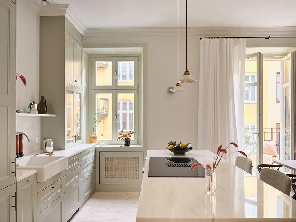 Légères touches pastel et mansarde : appartement à deux niveaux en Suède - Gallery image 3