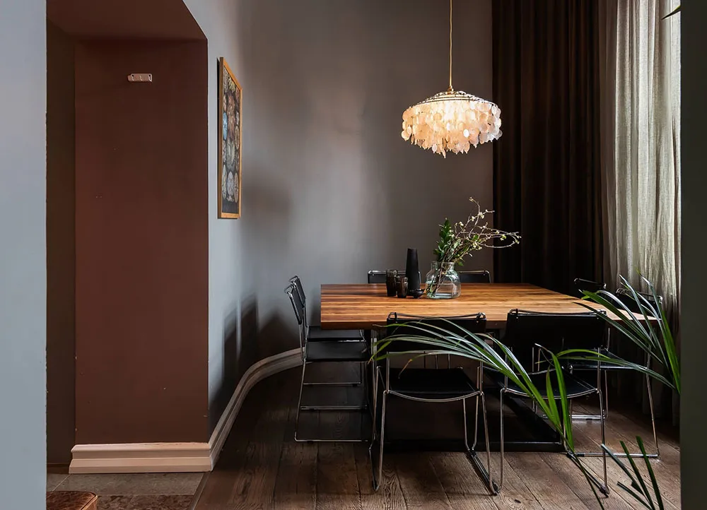 Atmospheric Gamma and Interesting Wall Decor in Swedish Apartment Design - Gallery image 10