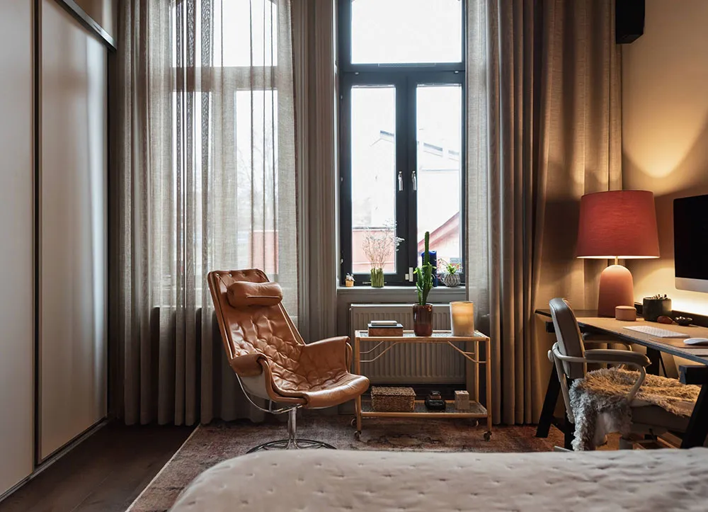 Atmospheric Gamma and Interesting Wall Decor in Swedish Apartment Design - Gallery image 17