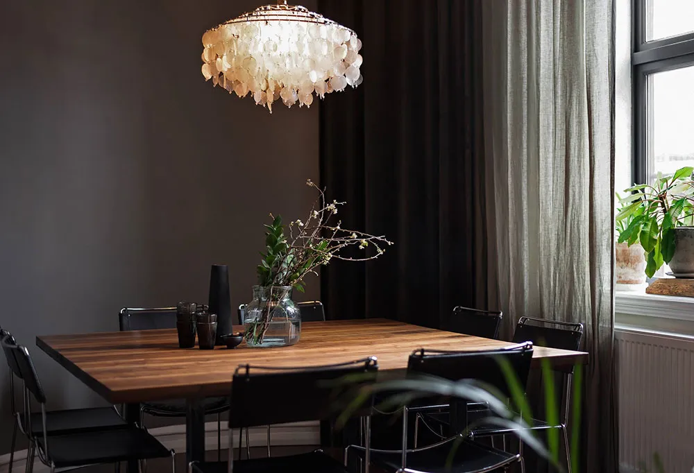 Atmospheric Gamma and Interesting Wall Decor in Swedish Apartment Design - Gallery image 9