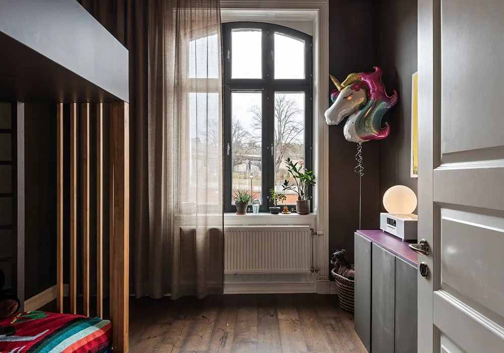 Atmospheric Gamma and Interesting Wall Decor in Swedish Apartment Design - Gallery image 24