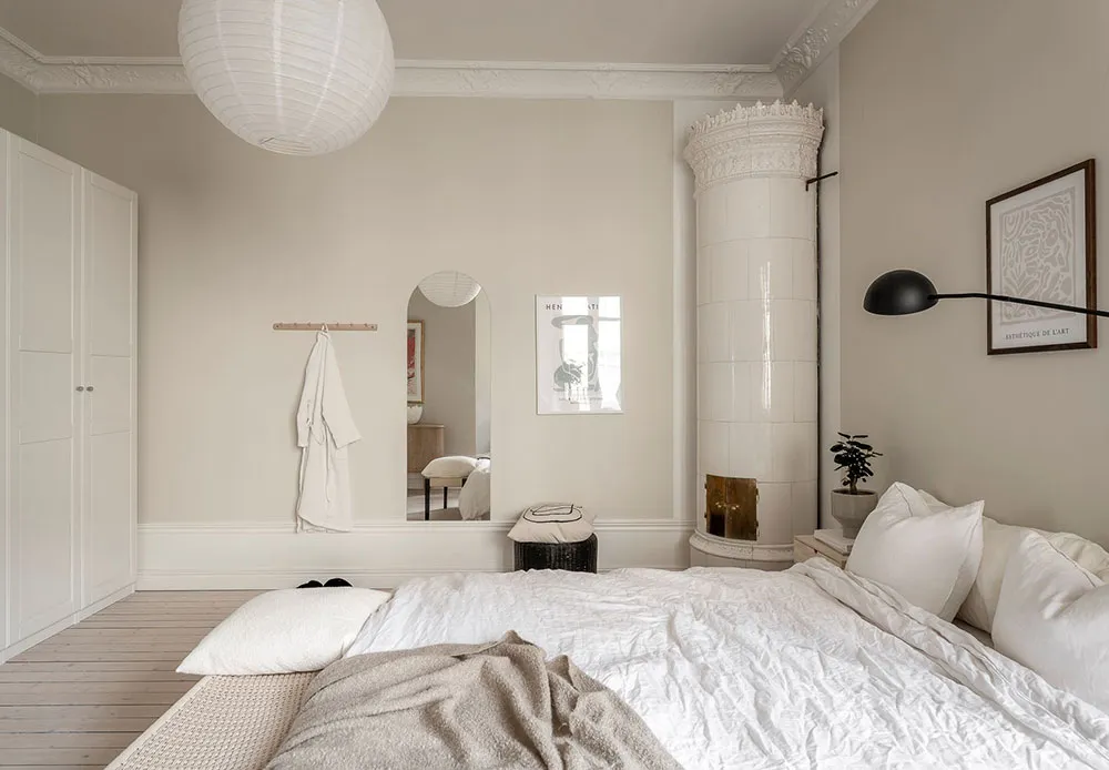 Стильная деревянная кухня и мягкая цветовая гамма: красивая квартира в Гётеборге (91 кв. м) - Gallery image 17