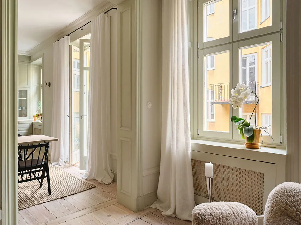 Légères touches pastel et mansarde : appartement à deux niveaux en Suède - Gallery image 18